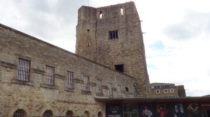 Castle tower incorporated into prison buildings