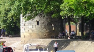 Part of the Abbey's enclosure wall along the banks of the river