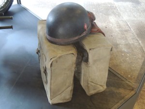 A disptach riders helmet and panniers