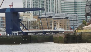 The entrance into all that remains of the West India Docks. The basin behind the gates is now a marina for private boats